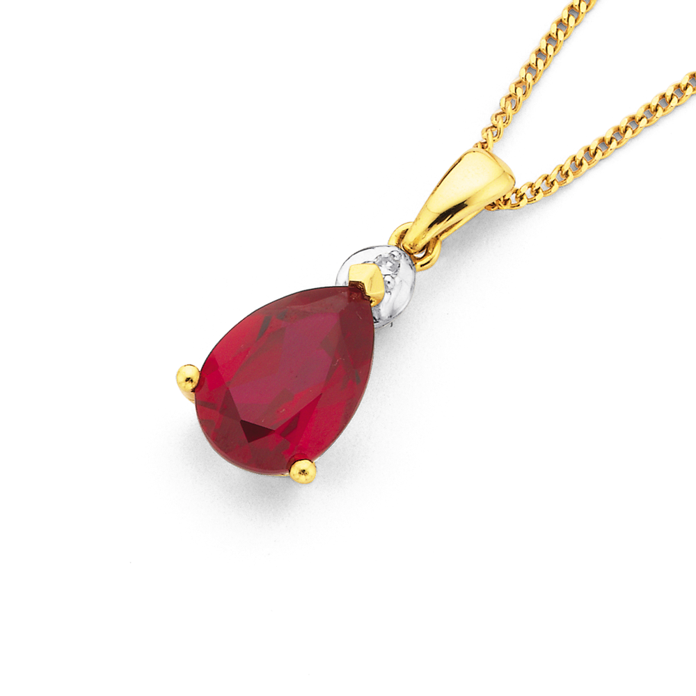 Gold and ruby pendant on sale
