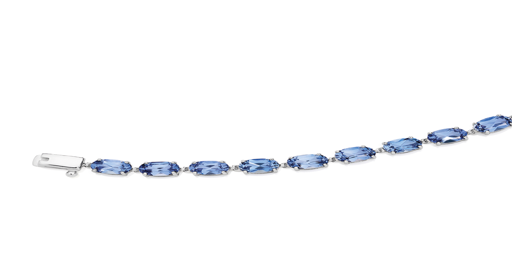 9ct White Gold Created Ceylon Sapphire Bracelet in Blue Prouds