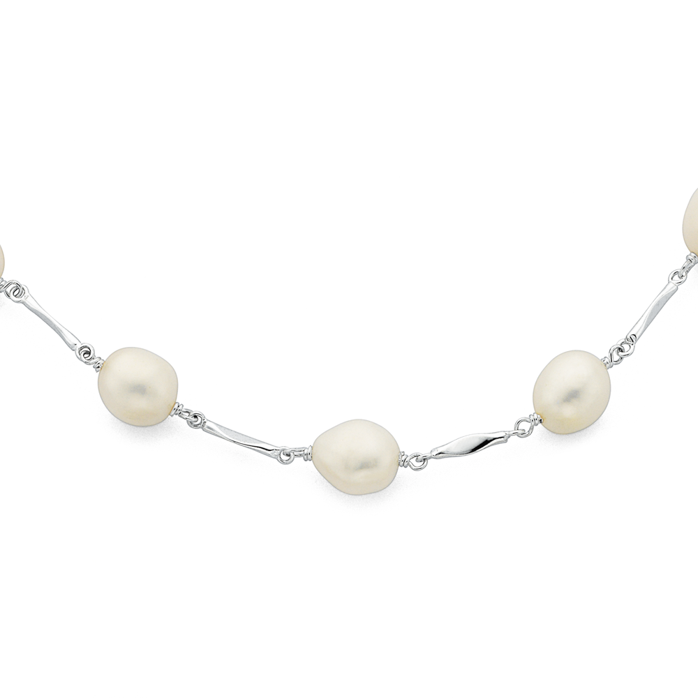 Elegant White Freshwater Oval Shape Pearl Necklace – Mangatrai Gems &  Jewels Pvt Ltd